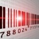 Barcode with red light ray and binary code in background